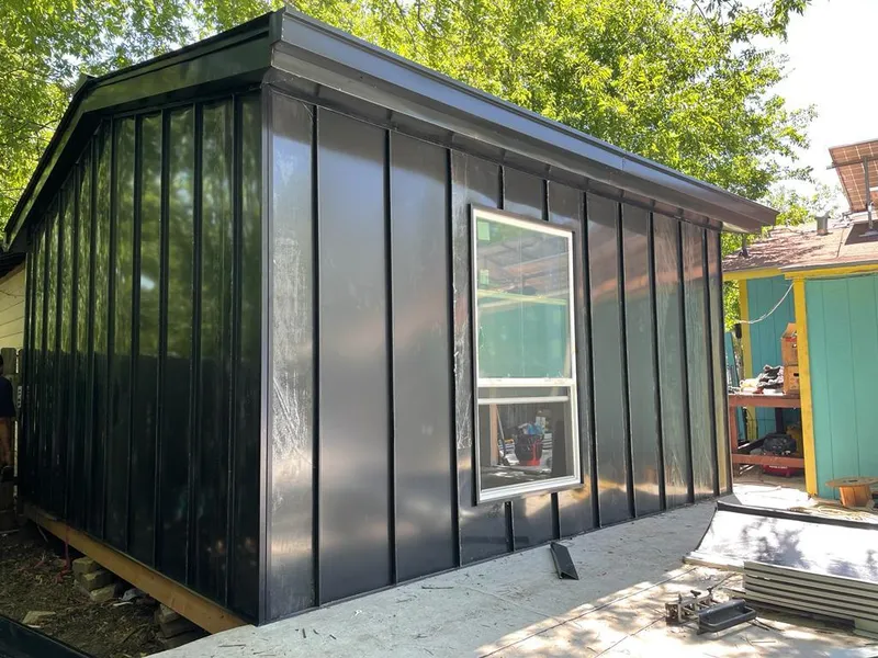Black standing seam metal wall panels for Metal Roof Installation in Duxbury