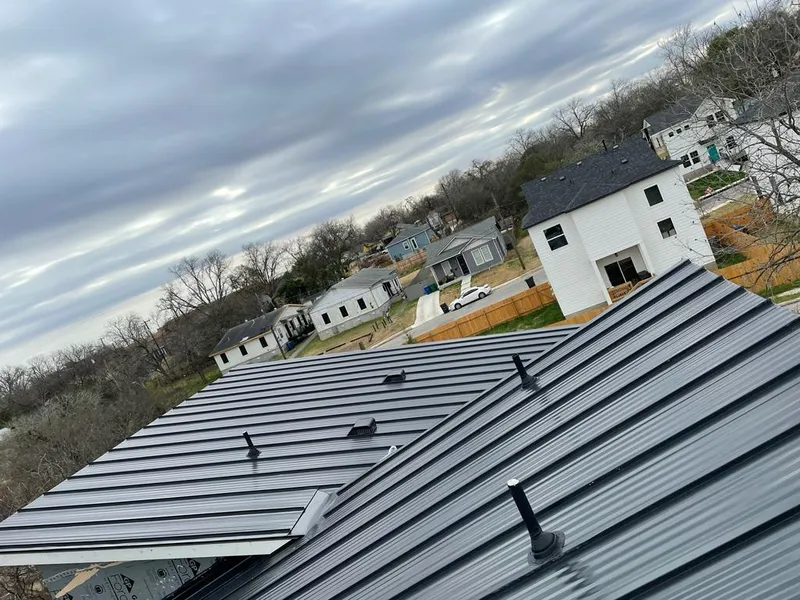 Standing seam metal roof panels with vents for Skylight Repair in Duxbury